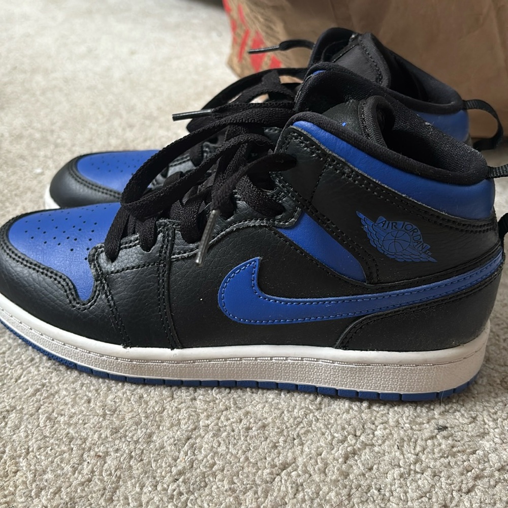 dark blue jordan 1s low